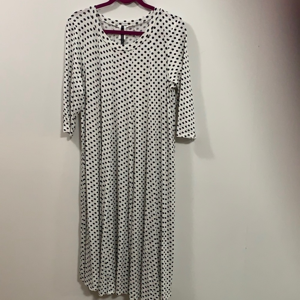 Will not go lower. MOA Women’s dress XL Black and White Polka dots.
